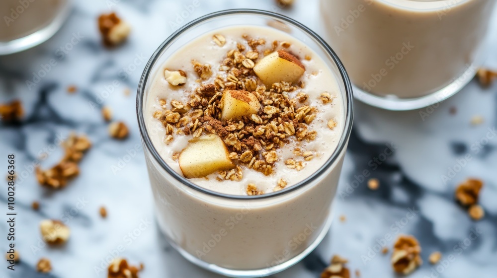 A delicious and healthy smoothie made with yogurt, apples, granola, cinnamon, and walnuts. Perfect for a fall breakfast or snack. A delicious and healthy smoothie made with yogurt, apples, granola, cinnamon, and walnuts. Perfect for a fall breakfast or snack.
