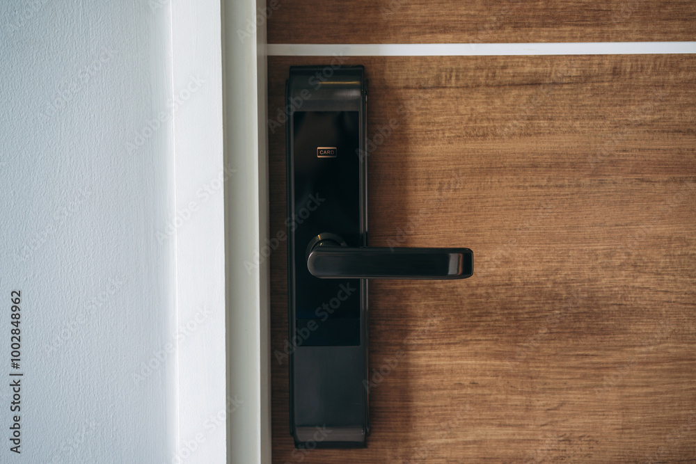 Electronic card key for open door in hotel. Smart card key to lock and unlock door. Security systems and protection concept. Electronic card key for open door in hotel. Smart card key to lock and unlock door. Security systems and protection concept.