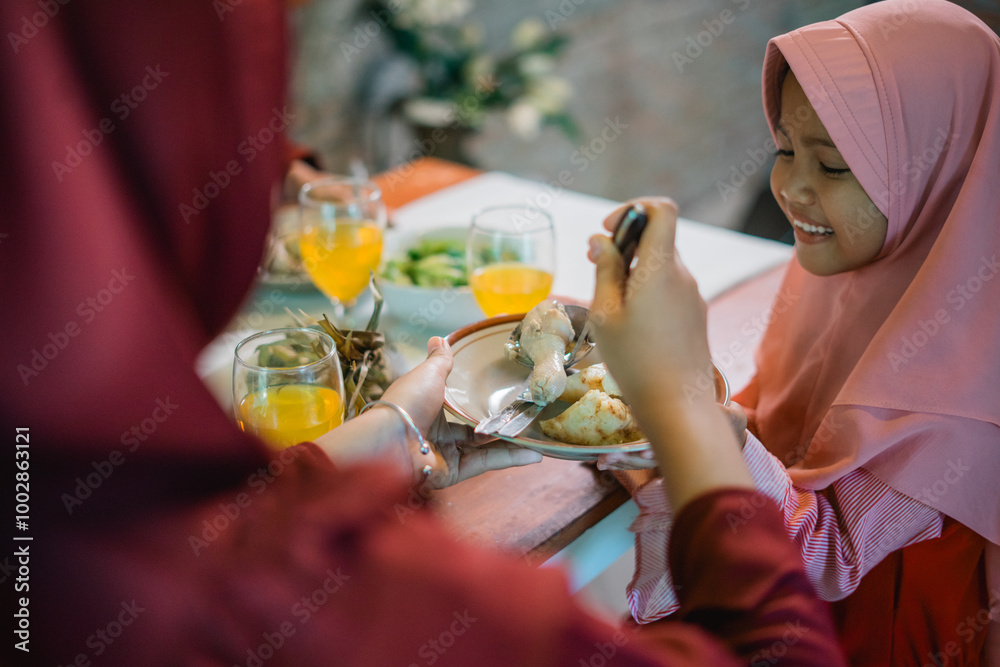 Fototapeta premium A heartwarming moment shared with family over a spread of delicious and delightful food