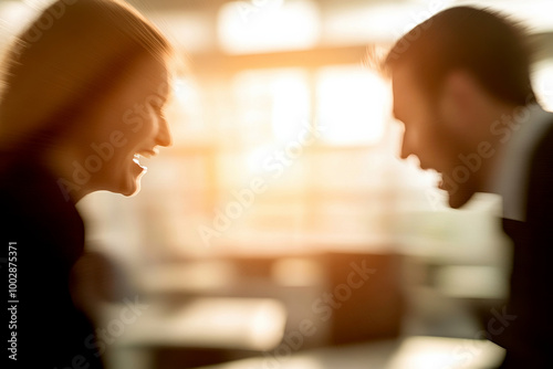 Two individuals engaged in an intense discussion, illuminated by warm sunlight. Emotions run high in this dynamic moment. photo