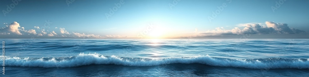 Fototapeta premium Serene ocean view at sunrise with gentle waves and clear sky.