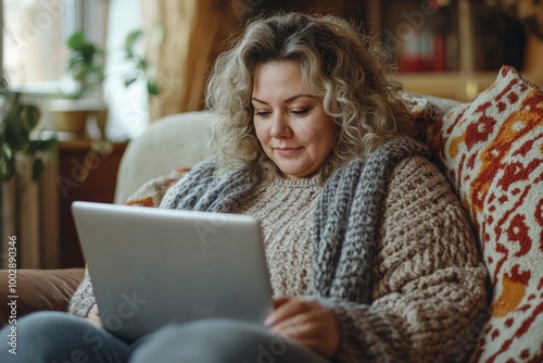 Overweight woman working on laptop from homeoffice, sitting on sofa, making video call, Generative AI