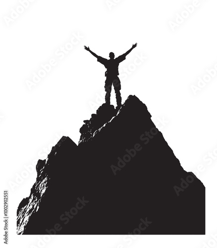 Silhouette of a person standing on a mountain peak with arms wide open 