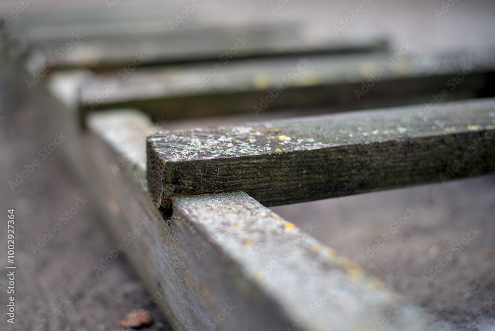An old wooden staircase on the ground