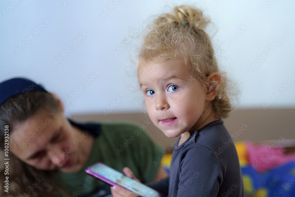 little girl playing on phone little girl playing on phone