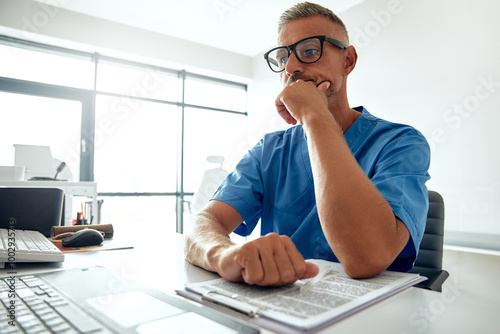 A medical professional is working diligently in a modern office to enhance health photo