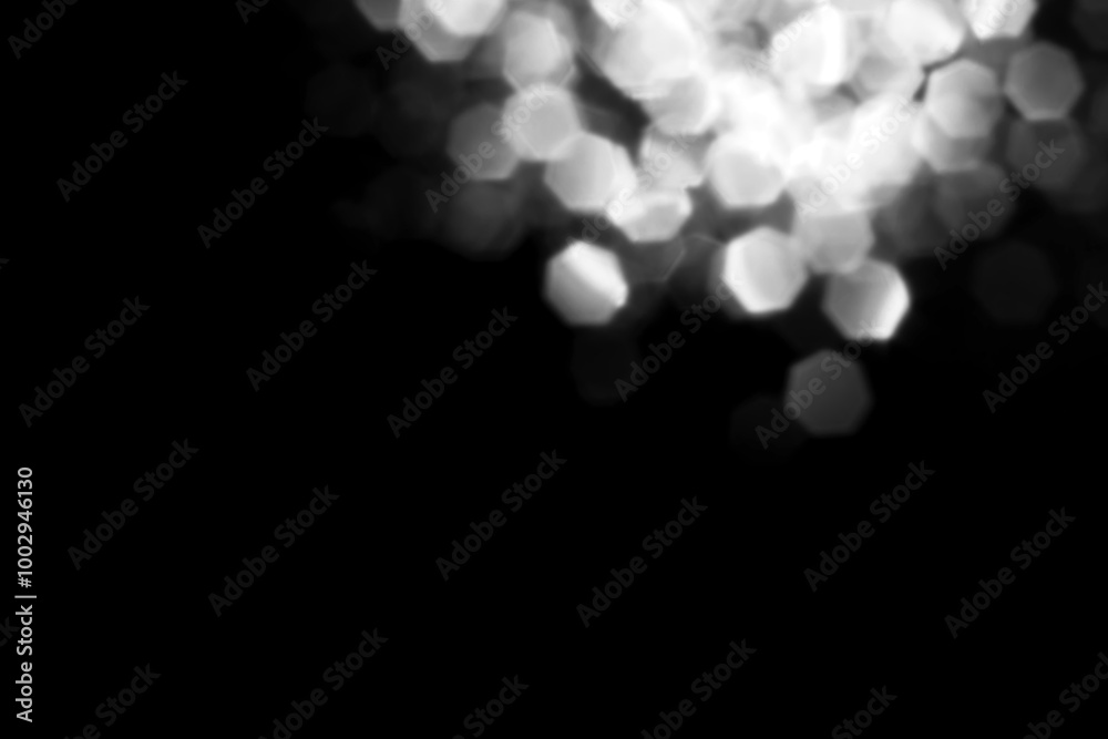 White gray blurred bokeh lights on black background. Glitter sparkle stars for celebrate. Overlay for your design White gray blurred bokeh lights on black background. Glitter sparkle stars for celebrate. Overlay for your design