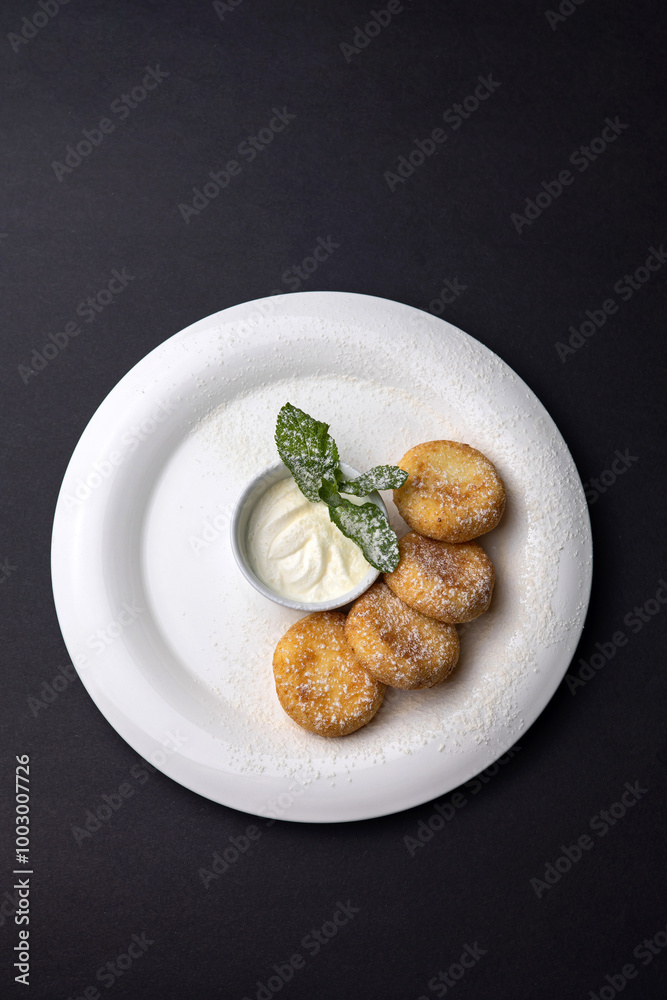 Delicious cheesecakes on a plate. Close up Delicious cheesecakes on a plate. Close up