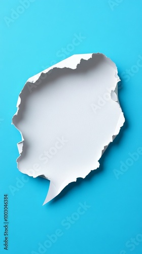 torn paper speech bubble on blue background