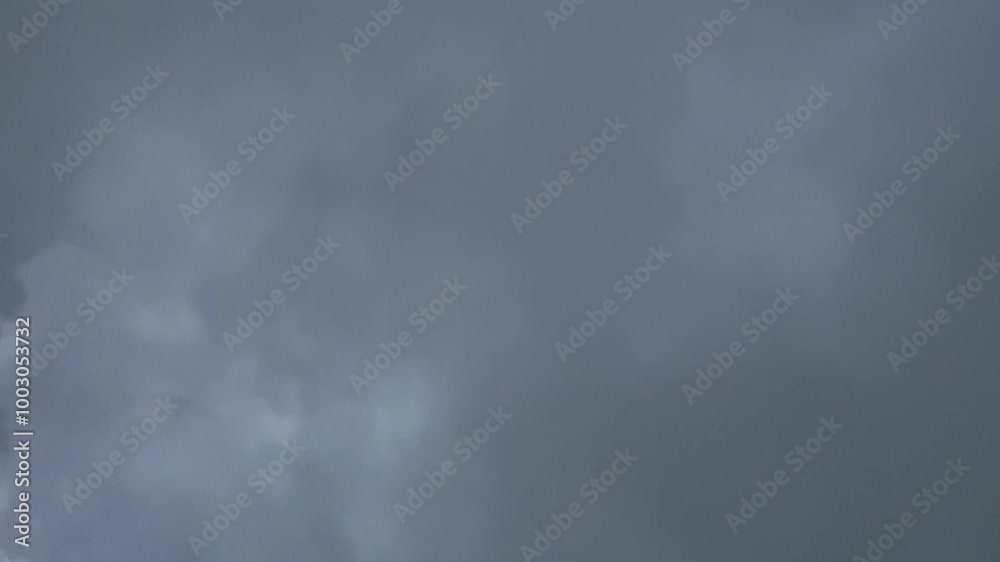 Icy Cloudy Smoke Plumes in the Air: Thick Clouds from Trash Burning, Moving in Blurry Motion Icy Cloudy Smoke Plumes in the Air: Thick Clouds from Trash Burning, Moving in Blurry Motion