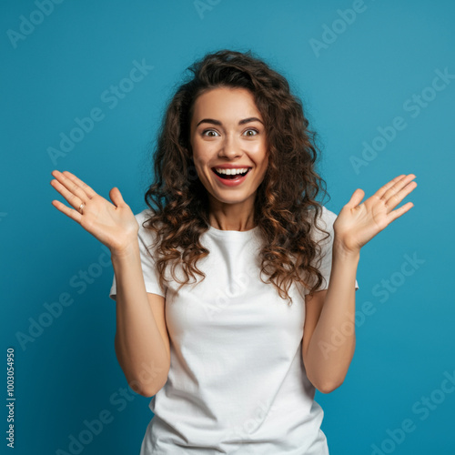 Excited Woman Expressing Joy and Surprise with Hands Up, Happy Young Woman Celebrating with Enthusiastic Expression