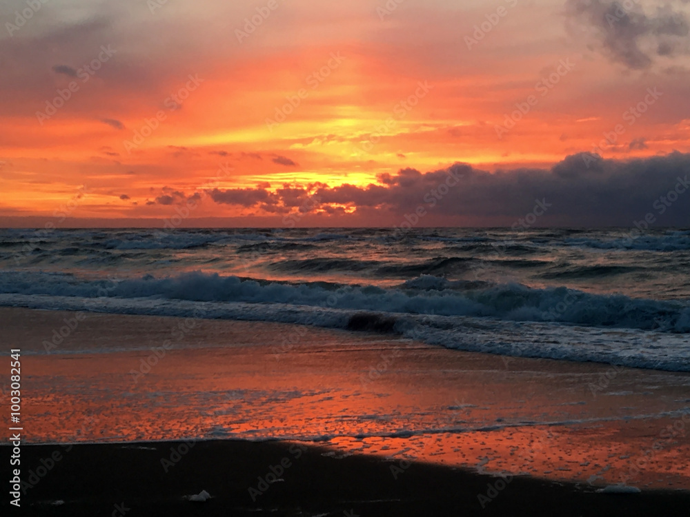 Obraz premium Dramatic sky over the Baltic Sea. Sunset on the Curonian Spit near Nida, Lithuania.