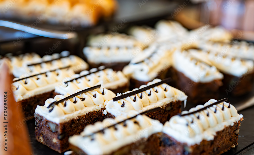 Chocolate cakes with grated nuts on a plate. Chocolate cakes with grated nuts on a plate.