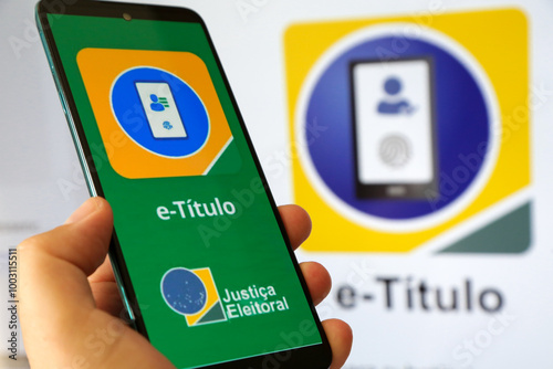 Aplicativo E titulo para eleições com fundo desfocado.