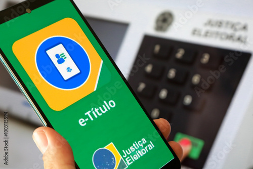 Aplicativo E titulo para eleições com fundo desfocado.