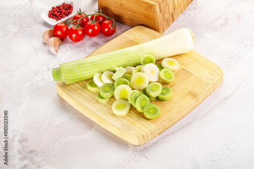 Ripe sliced leek over board