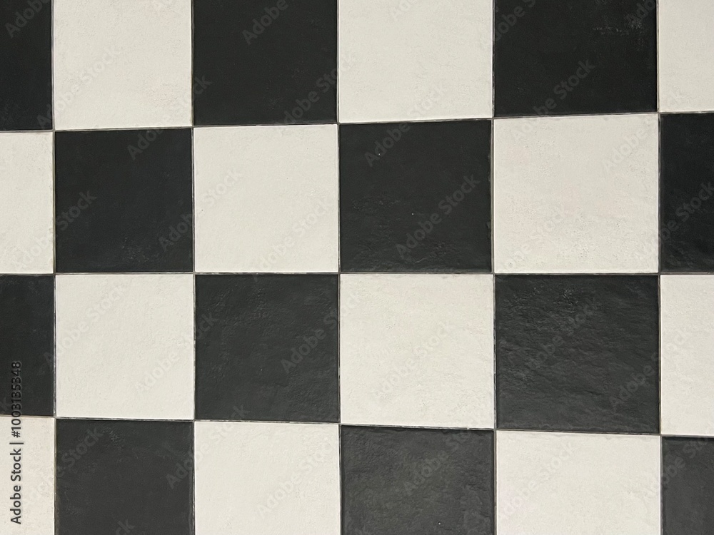Black and white square tiles. Tiles on the floor Black and white square tiles. Tiles on the floor