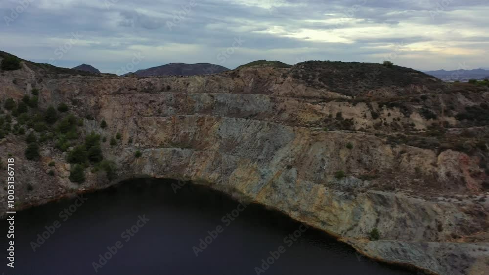 Aerial view of La Union Mining Park and ocher-tinted water lake. Aerial view of La Union Mining Park and ocher-tinted water lake.