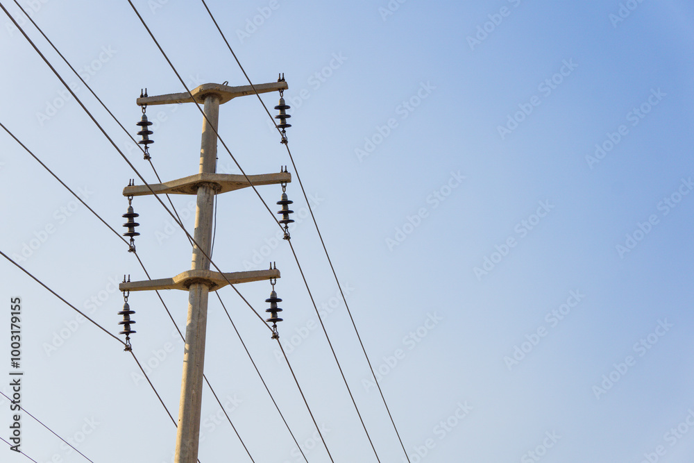 metal electric pole and cables passing through it metal electric pole and cables passing through it