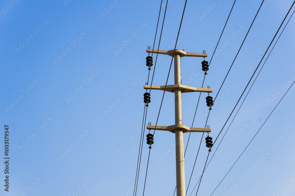 metal electric pole and cables passing through it metal electric pole and cables passing through it