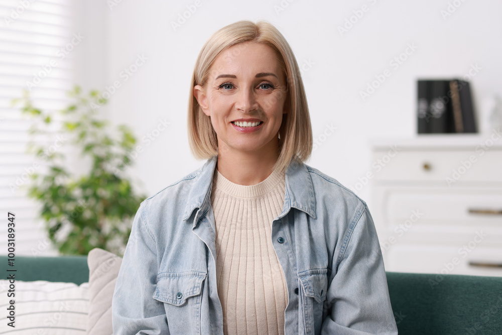 Portrait of smiling middle aged woman at home Portrait of smiling middle aged woman at home