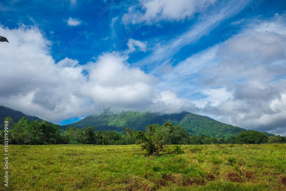 Scenic view of Arenal Volcano in central Costa Rica at foggy day.