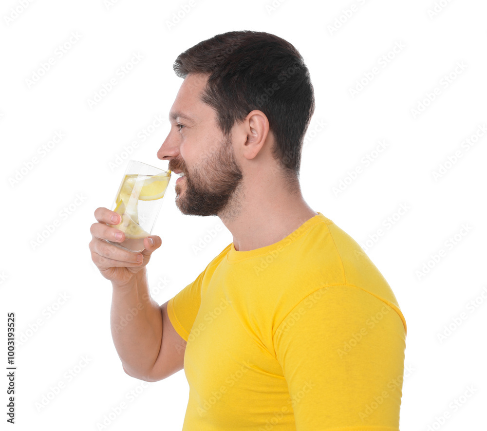 Handsome man drinking water with lemon on white background