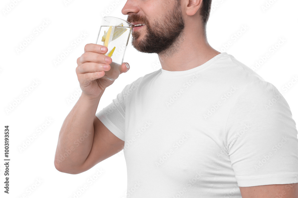 Man drinking water with lemon on white background, closeup Man drinking water with lemon on white background, closeup