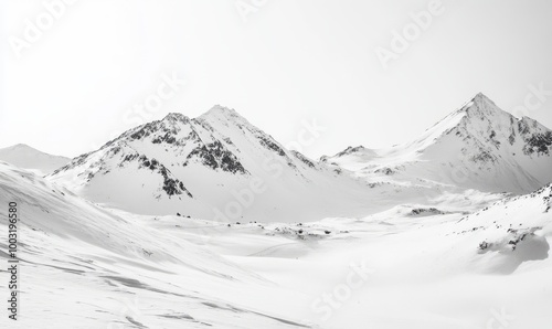 Black and white photo of snow-covered mountains in