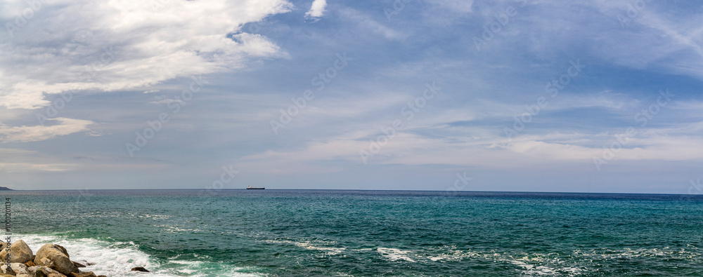 Panoramic view of Caribbean beach on a sunny day. Macuto, La Guaira state. Venezuela