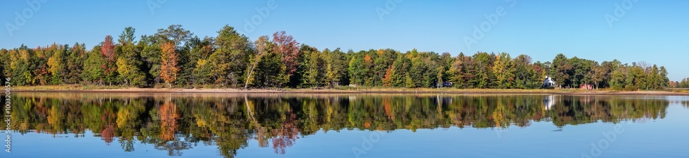 Colorful trees on Lake Nokomis, Tomahawk Wisconsin at the end of Septmber Colorful trees on Lake Nokomis, Tomahawk Wisconsin at the end of Septmber