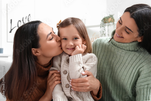 Young lesbian couple with a...