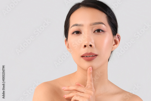 Beautiful Asian woman on li...