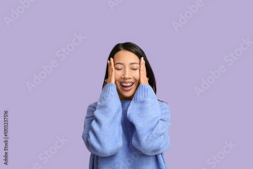 Young Asian woman laughing ...