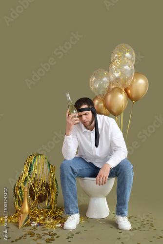 Young man with hangover aft...