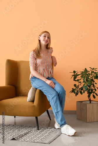 Young woman relaxing in mod...