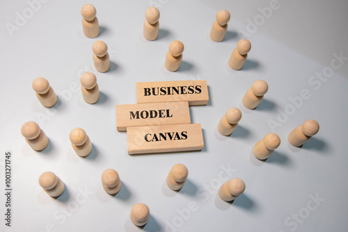 Business model canvas, Concept, Wooden blocks with slogan business model canvas