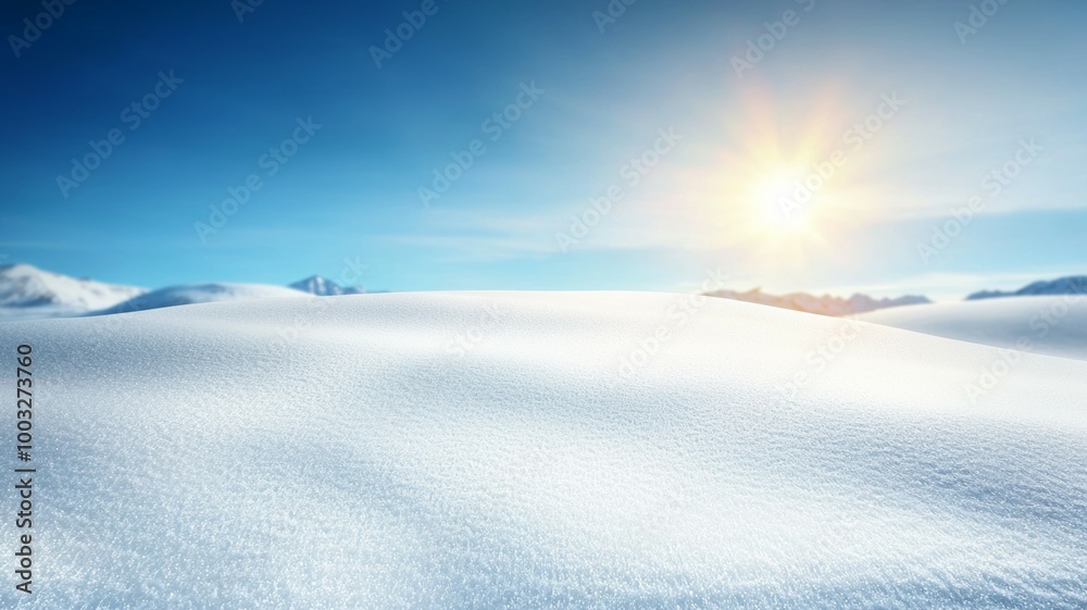 A snow covered field with a bright sun shining on it A snow covered field with a bright sun shining on it
