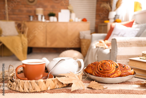 Teapot with cup of hot beve...