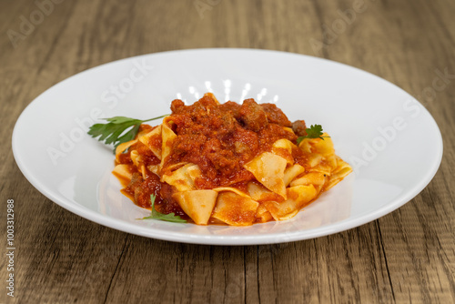 Wallpaper Mural Pappardelle pasta served with lamb ragu sauce is cooked to perfection Torontodigital.ca