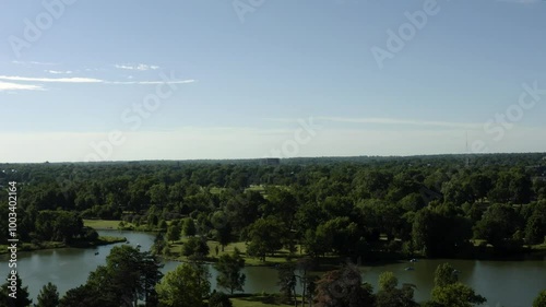 A scenic view of Forest Park in St. Louis, Missouri, showcasing its lush greenery, open spaces, and historic landmarks, offering a peaceful retreat and recreational hub for locals and tourists alike.
