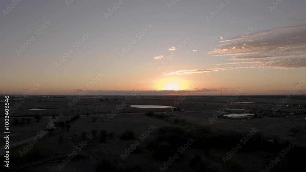A breathtaking sunset peeking through clouds over rural land, casting warm hues across the landscape, highlighting the beauty of nature and the tranquility of the countryside. A breathtaking sunset peeking through clouds over rural land, casting warm hues across the landscape, highlighting the beauty of nature and the tranquility of the countryside.