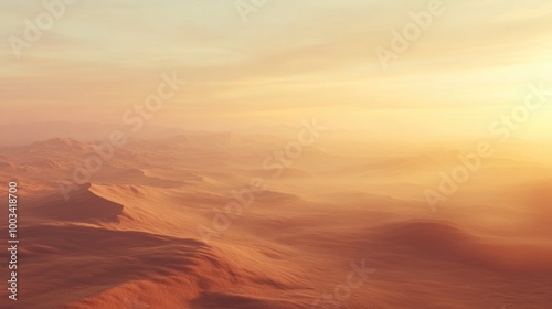 A hazy desert landscape at sunset with sand dunes glowing in soft orange light and the distant horizon fading into the mist.