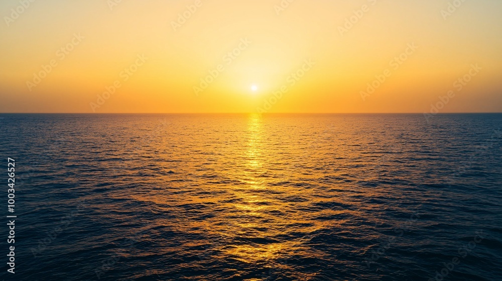Naklejka premium Serene Sunset Over Calm Ocean Waters