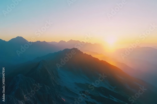 Serene Sunrise Over Majestic Mountain Landscape