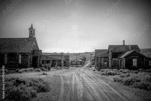 Fototapeta Naklejka Na Ścianę i Meble -  Bodie, California, a historic ghost town, offers a glimpse into the Old West with its abandoned buildings and desolate streets. Once a bustling mining town, it now stands as a preserved relic.
