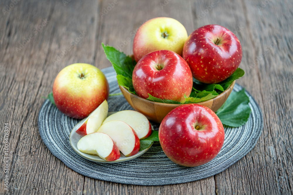 Fresh Red Japanese Apple in wooden bowl on wooden background, Red Apple in wooden basket. Fresh Red Japanese Apple in wooden bowl on wooden background, Red Apple in wooden basket.