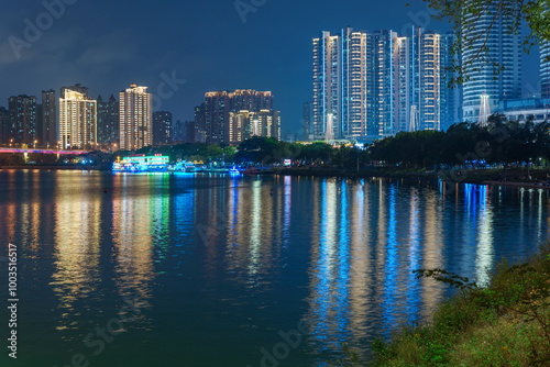 Night lighting of high-rise buildings in riverside cities