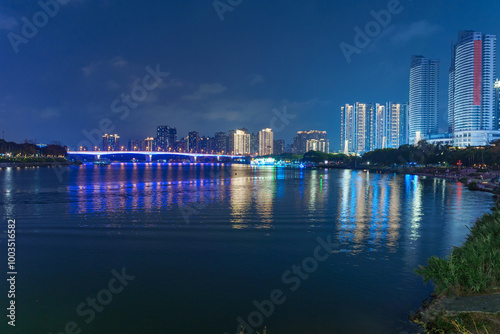 Night lighting of high-rise buildings in riverside cities