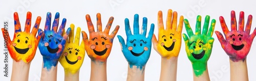 Seven hands painted in various bright colors with happy faces drawn on them, with the hands raised up in a white background.